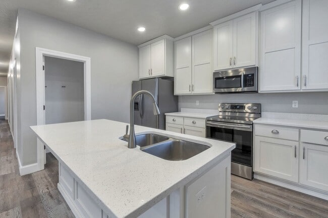 Photo - Spacious 4 Bed, 2 Bath Pet-Friendly Home with Central Air & 2-Car Garage! Available on July 6th!