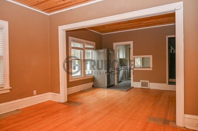 Photo - Large 3 Bedroom 2 Bath House w/Fenced in Yard and 2 Stall Garage Available Soon!