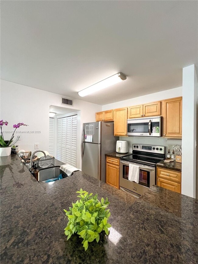 Building Photo - 15821 SW 104th Terrace Unit 203 Rental