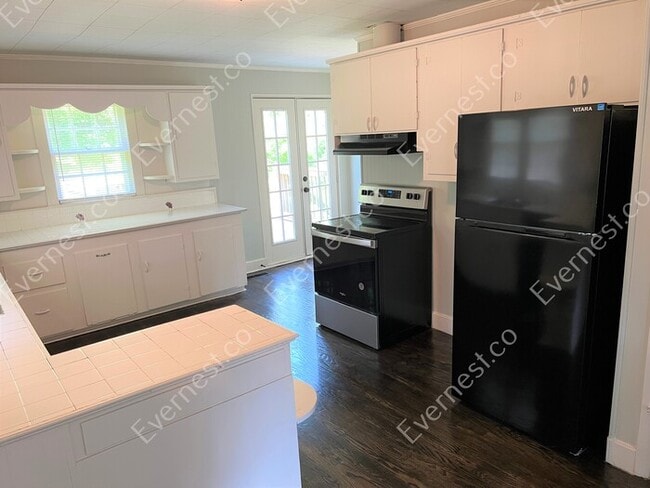 Photo - 3 Bed, 2 Bath Home with Carport / Pet-Friendly / Vouchers Accepted / Coming Soon!