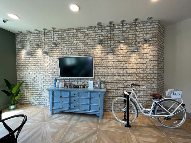 Explore this chic living area that blends modern design with vintage charm.