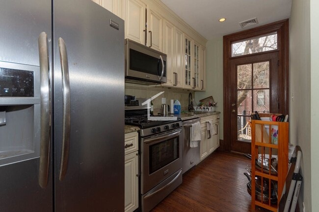 Photo - 9/1 Modern 4BR/2BA with AC, laundry in unit @ Brigham Circle!