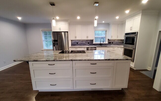 Photo - "Charming 3-Bed Oasis with Granite Touches & Cozy Fireplace on Spartan Road!"
