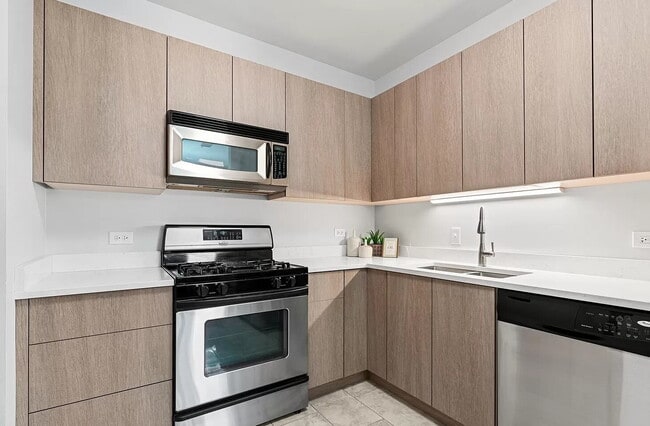 Photo - Chic 1-Bed Condo with Hardwood Floors in Prime Chicago Location!
