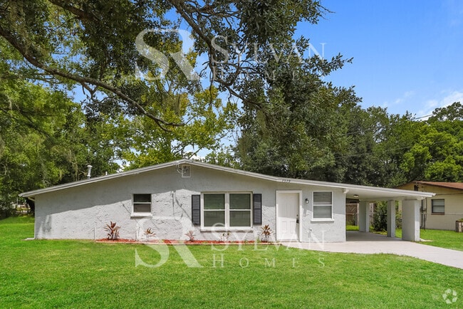 Building Photo - Feel welcome in this well-maintained 4BR 2... Rental