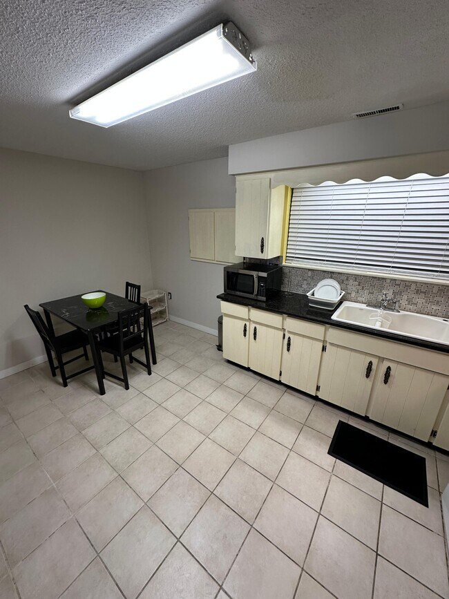 Photo - 784 E 56th Ave