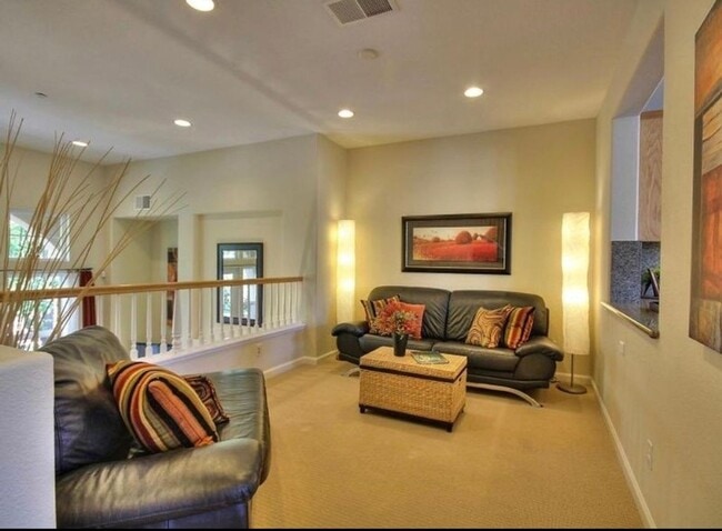 Photo - UPGRADED TOWNHOME IN RIVERMARK SOUGHT-AFTER WALK-UP SETTING