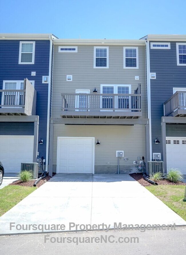 Photo - Modern 3-Story Townhome with Entry-Level Bonus Room, Back Deck & Garage , Community Pool in North...