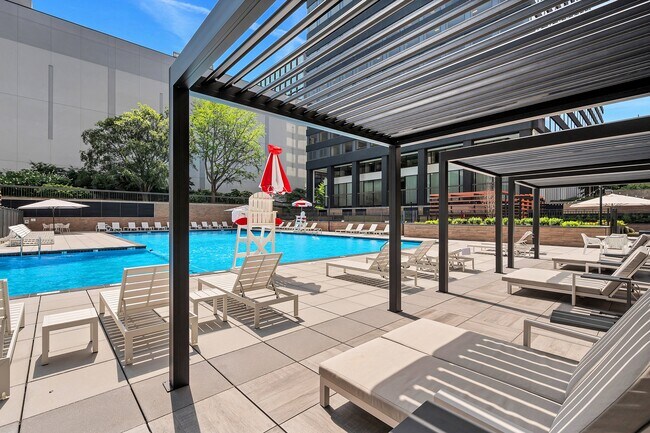 Pool & Sundeck with Outdoor Seating and Lounge Chairs