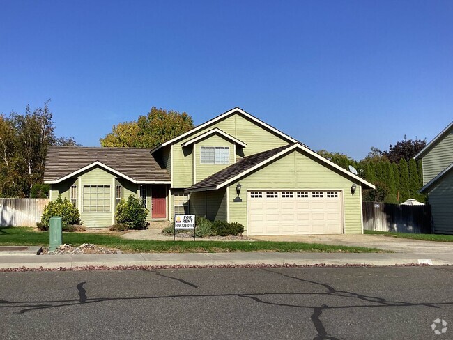 Building Photo - Split-Level Home with Fireplace and Patio ...