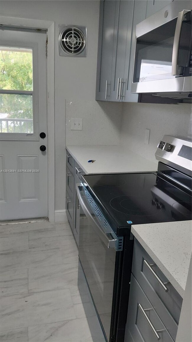 Building Photo - 5480 NW 11th St Unit 306
