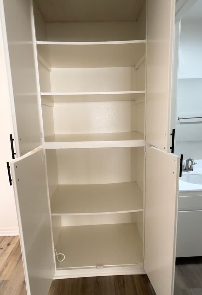 2 bedroom unit linen closet - Sun Harbour Apartments
