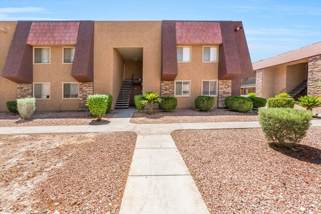 Building Photo - Guard-Gated Condo Living with Resort-Style Community Amenities!
