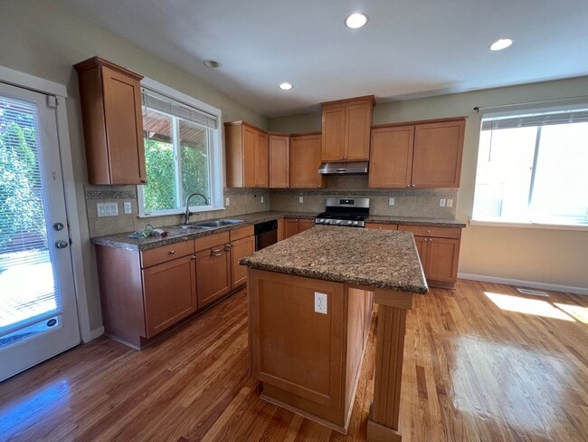Photo - Spacious 4 Bedroom Home with Zen Backyard and 3-Car Garage