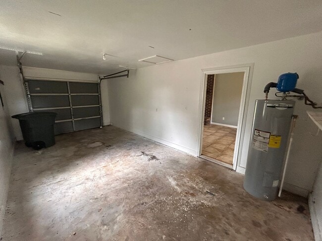 Photo - 3br 1BA house with decorative mantle and garage with move in special for July!