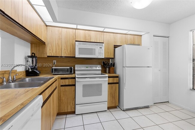 Building Photo - 12990 SW 88th Ln Unit B203