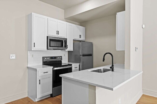 Photo - Live in Style – 1BR Townhouse in McKinley ...