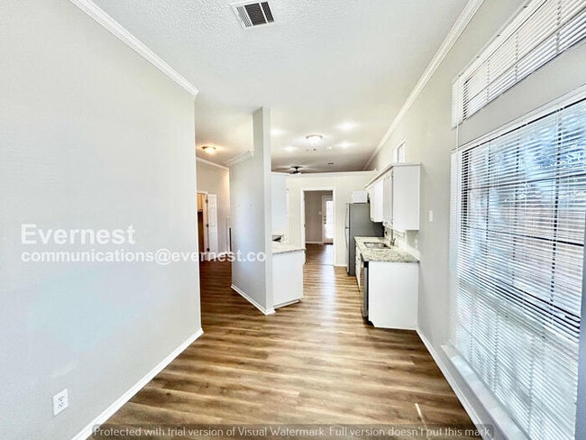 Photo - 3 Bed, 2 Bath Home with Fenced Yard & Garage / Pet-Friendly / Available Now!