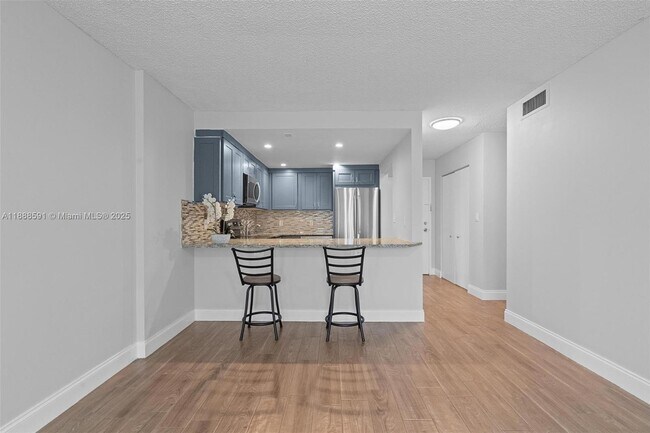 Building Photo - 16851 NE 23rd Ave Unit A107