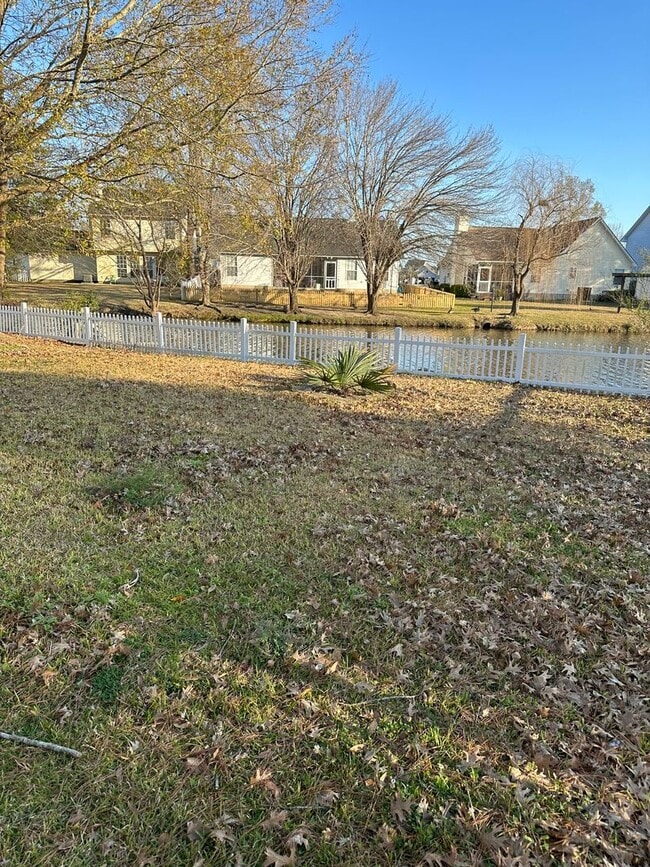 Photo - 3 x 2 with garage and pond view