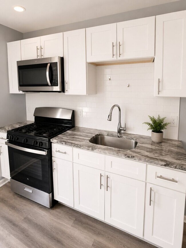 Photo - 3-Bedroom Home with Spacious Backyard and Central Air
