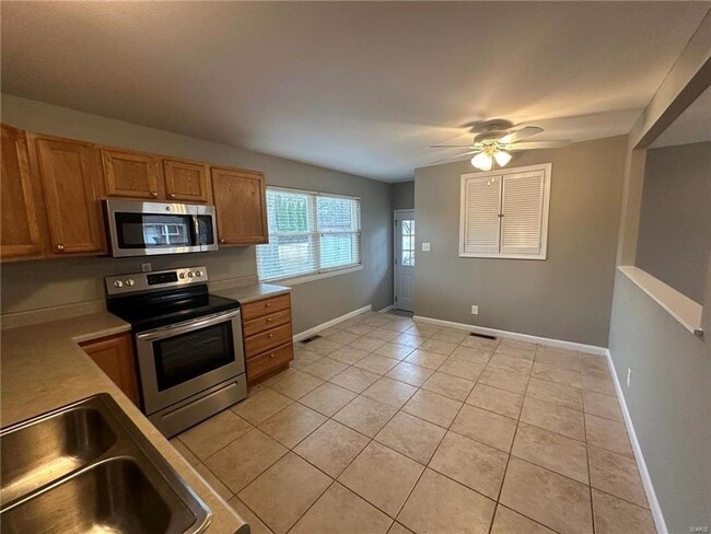 Photo - Discover the epitome of comfort in this 3-bed, 2-bath ranch-style gem.