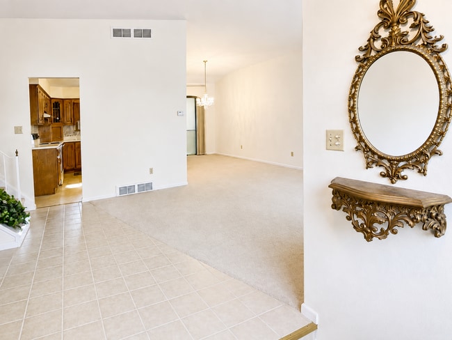 Photo - Spacious 3-Bedroom Split-Level with Formal Dining Room, Fireplace, and Fenced Backyard