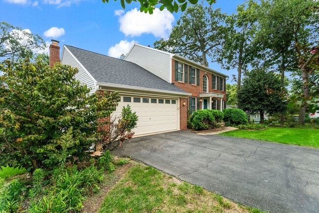 Photo - 3-Level Brick-Front Colonial in Maple Vall...