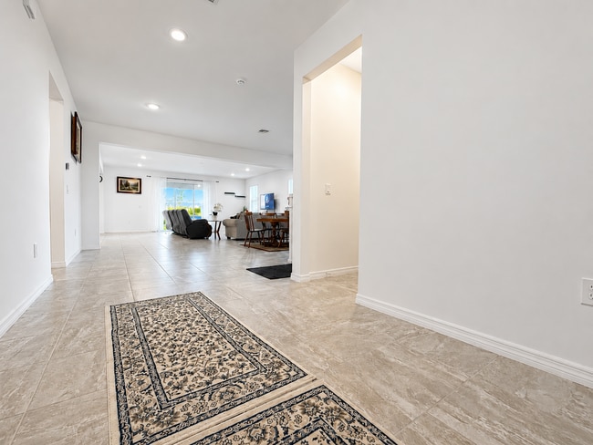 Photo - Experience modern & expansive living in this corner-lot 5Bedrooms/3.5Bath home at Ocala!