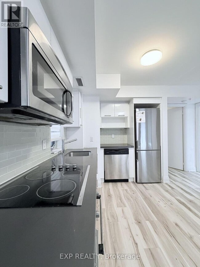 Photo - 555 Wilson Ave Unité 112-E