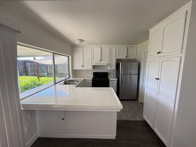 Photo - 4 Bedroom, 2 Bath Home with Large Yard + Two Car Garage