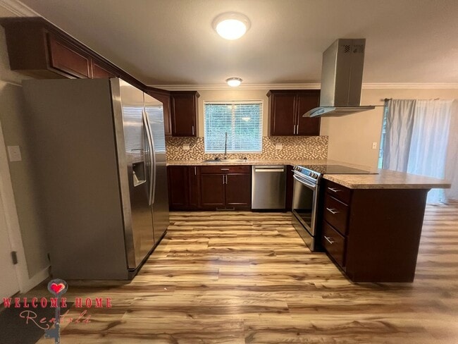 Photo - Remodeled rambler, no carpet, with HUGE fenced yard!!