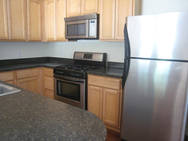 Kitchen, includes dishwasher, fridge, oven, gas range, microwave