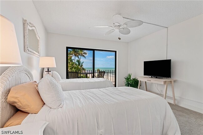 Building Photo - 3399 Gulf Shore Blvd N Unit 309