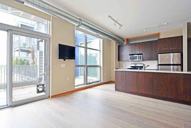 Photo - Modern 2-Bedroom Apartment with Private Patio in the Heart of Uptown Unidad 209