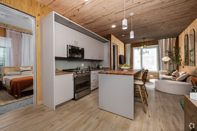 2BR, 2BA - 828SF - Kitchen and Living Room