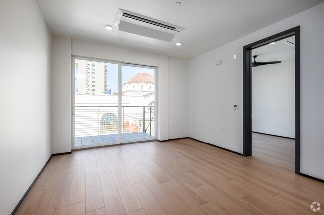 2BR, 2BA - 1061SF - Living Room - Cypress Apartments