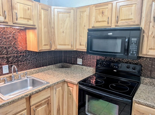 Photo - Spacious 1BR Condo – Pool Access & Utilities