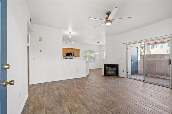 Photo - Charming 2-Bedroom First Floor Featuring Open Layout, Fireplace, Patio & Community Pool