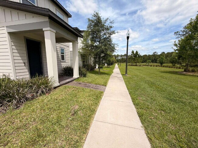 Photo - "Spacious 3-Bedroom Retreat in Winter Garden - 5520 Sq Ft of Comfort!"