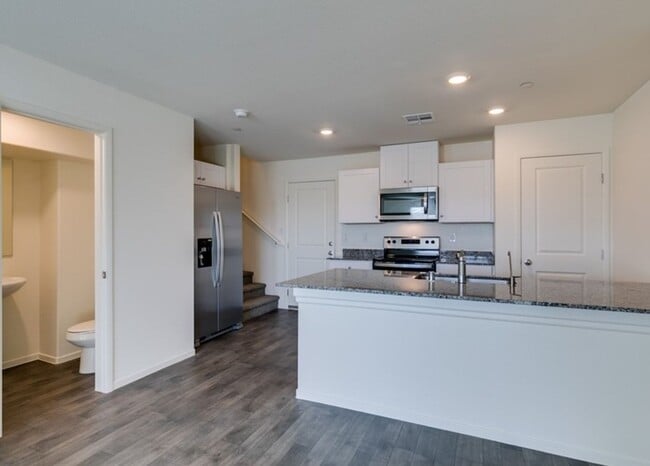 Photo - New townhome with attached 2 car garage.