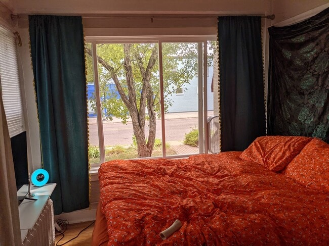 Sunroom with French doors & lots of natural light - 1335 W Minnehaha Ave