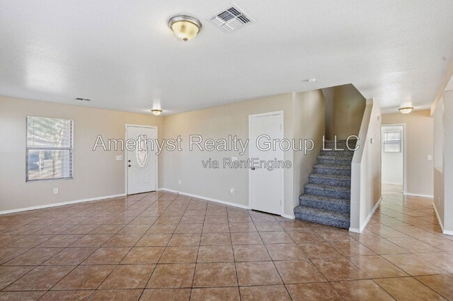5931 W Albeniz Pl
