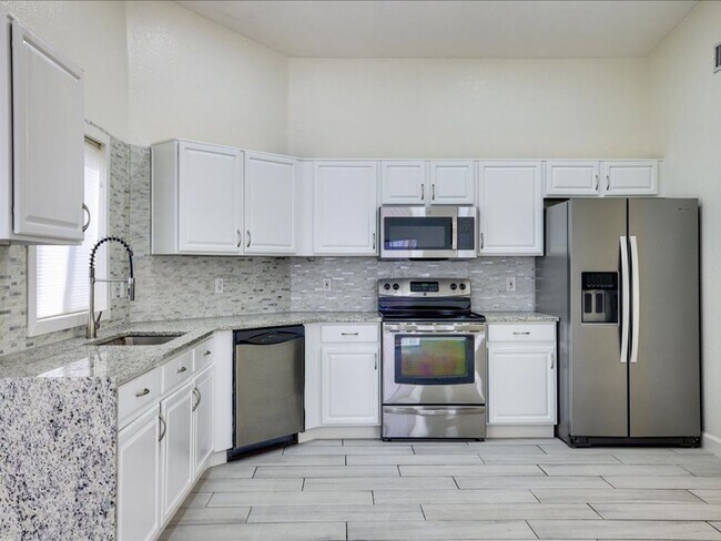 Photo - Spacious 3-Bedroom Home with 3-Car Garage & Large Backyard