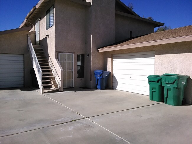 View of the apartment and attached garage - 437 S Sunset St Unit C