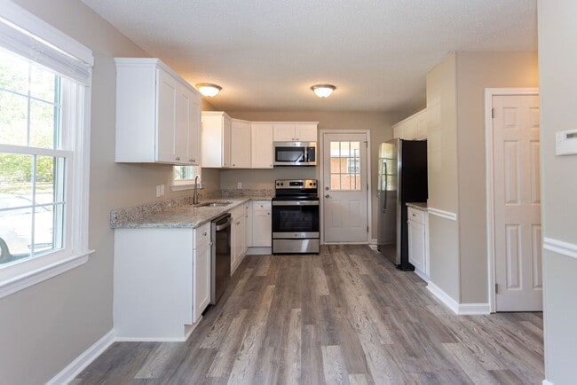 Photo - Welcome to this beautiful newly renovated 3-bedroom brick ranch!