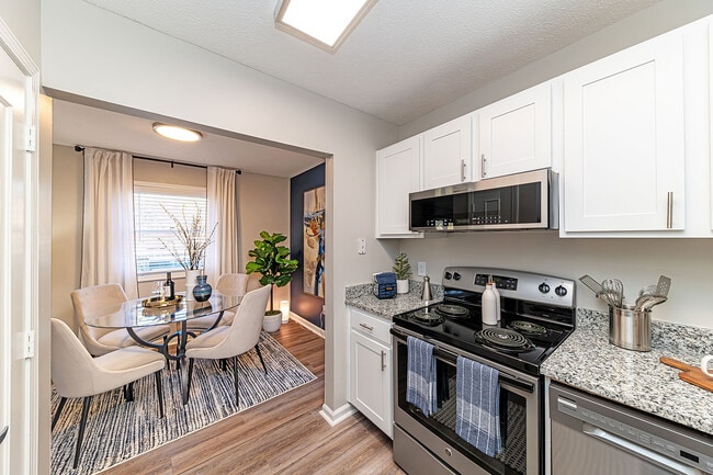 Kitchen with granite counters and stainless appliances