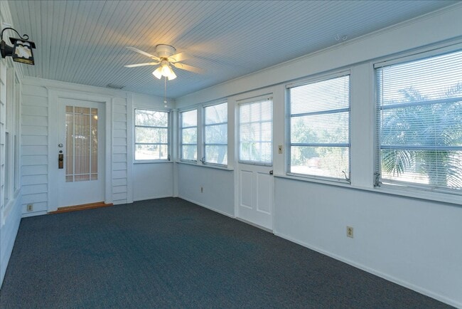 Photo - Run don't walk for this one of a kind beautifully maintained Old Florida Charmer on a park like d...