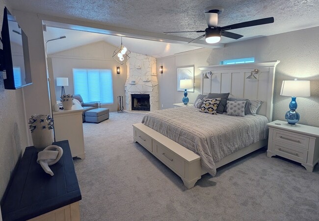 Master Bedroom with King and Electric Fireplace - 3408 25th St House