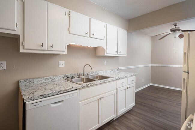 3BR, 2BA - 1,049SF - Kitchen - Creekside Apartments
